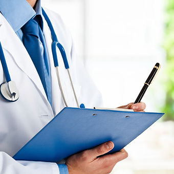 Doctor in white coat ready to assist patients